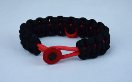red and black heart disease support paracord bracelet with red button front and red ribbon