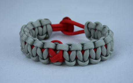 red and grey heart disease support paracord bracelet with red button back and red ribbon
