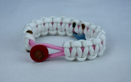 soft pink and white sids support paracord bracelet with red button front and tarheel blue and pink ribbon