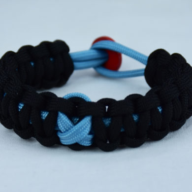 tarheel blue and black prostate support paracord bracelet with red button back and tarheel blue ribbon