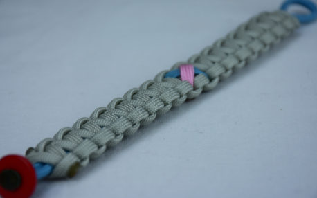 tarheel blue and grey sids support paracord bracelet with red button corner and tarheel blue and pink ribbon