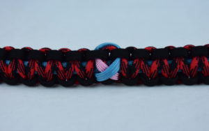 tarheel blue black and red and black camouflage sids support paracord bracelet with tarheel blue and soft pink ribbon in center