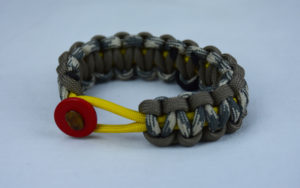 yellow tan and desert sand foliage camouflage pow mia support paracord bracelet with red button front and black ribbon